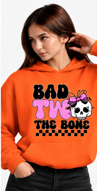 Bad to the Bone Skull Halloween Hoodie in orange — same original graphic